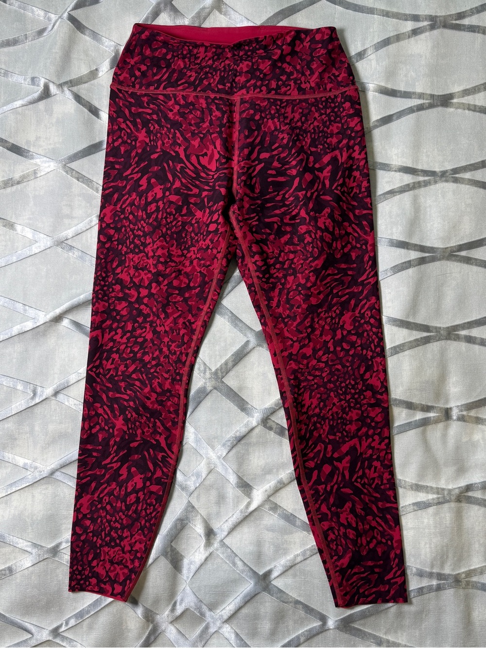 Peloton Leggings Size Large.  Pink and black design.  Like new.